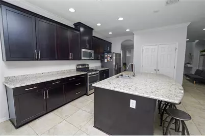 8775 Sentiero Drive, Land O Lakes, FL 34637 - Photo 32