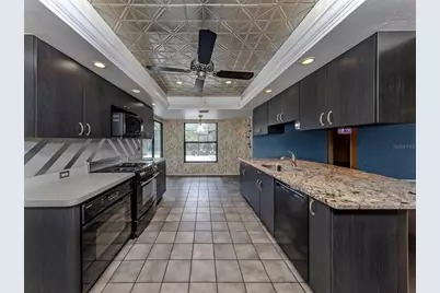 4361 Whispering Woods Place, Sarasota, FL 34233 - Photo 10