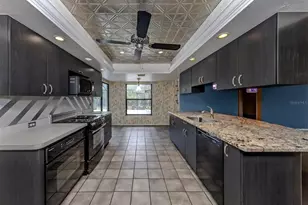 4361 Whispering Woods Pl, Sarasota, FL 34233 - Photo 10