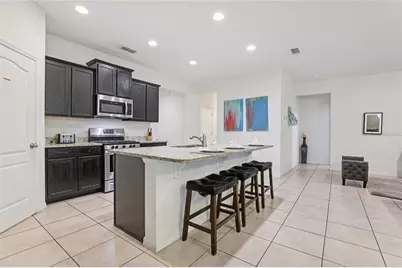 7033 Oakwood Street, Davenport, FL 33837 - Photo 12