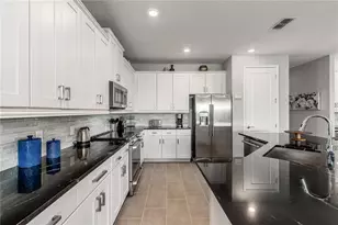 884 Golden Bear Dr, Reunion, FL 34747 - Photo 18