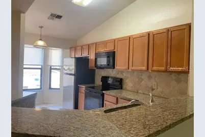 7807 Sugar Brook Court #7807, Orlando, FL 32819 - Photo 6