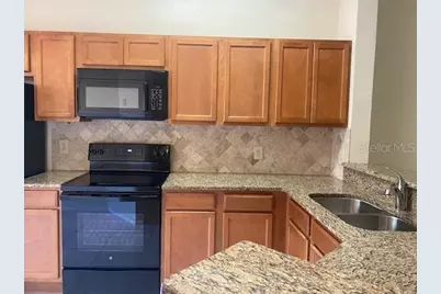 7807 Sugar Brook Court #7807, Orlando, FL 32819 - Photo 10