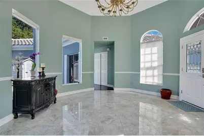 7906 Lost Cove Court, Orlando, FL 32819 - Photo 6