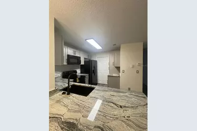 7606 Pissarro Drive #14102, Orlando, FL 32819 - Photo 4