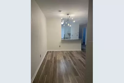 7606 Pissarro Drive #14102, Orlando, FL 32819 - Photo 2