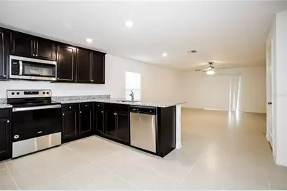 1677 Hideaway Flat Street, Mascotte, FL 34753 - Photo 4