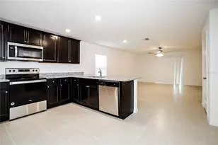 1677 Hideaway Flat St, Mascotte, FL 34753 - Photo 4