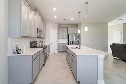 8833 Bethpage Lane, Champions Gate, FL 33896 - Photo 12