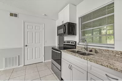 1222 Woodman Way, Orlando, FL 32818 - Photo 20