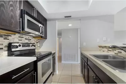 5957 Windhover Drive #C03, Orlando, FL 32819 - Photo 10