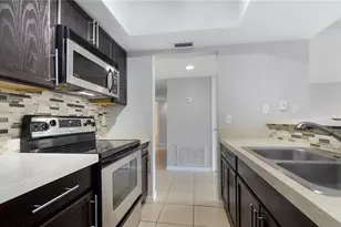 5957 Windhover Dr, Orlando, FL 32819 - Photo 10