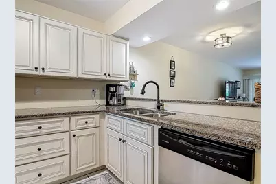 445 Bouchelle Drive #104, New Smyrna Beach, FL 32169 - Photo 2