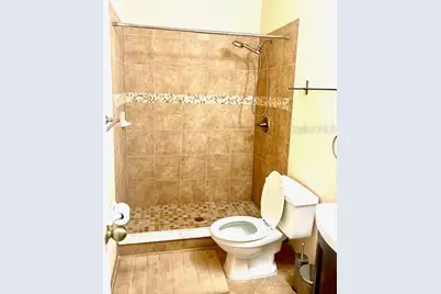 8214 Ambrose Cove Way, Orlando, FL 32819 - Photo 14