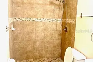 8214 Ambrose Cove Way, Orlando, FL 32819 - Photo 14