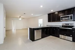 1674 Hideaway Flat St, Mascotte, FL 34753 - Photo 4