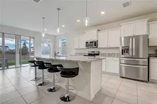 7889 Penrose Pl, Wildwood, FL 34785 - Photo 6