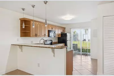 3651 N Goldenrod Road #E102, Winter Park, FL 32792 - Photo 6