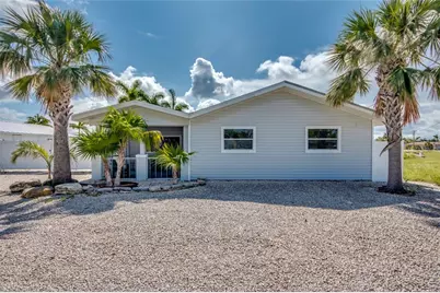 16040 Tortuga Street, Bokeelia, FL 33922 - Photo 1