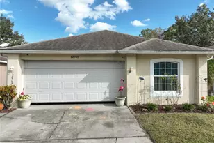12905 Odyssey Lake Way, Orlando, FL 32826 - Photo 2