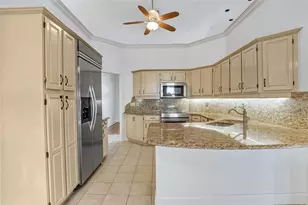 7725 Apple Tree Cir, Orlando, FL 32819 - Photo 12