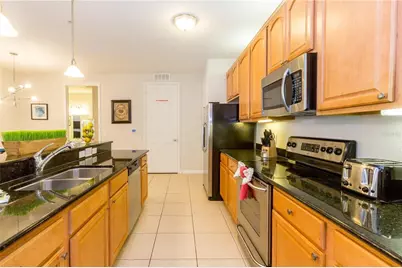 5025 Shoreway Loop #105, Orlando, FL 32819 - Photo 10