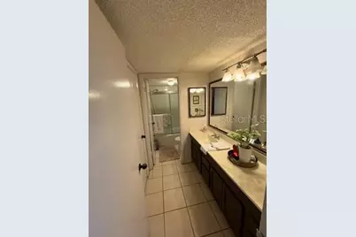 4846 Pebble Beach #1010B, Orlando, FL 32811 - Photo 14