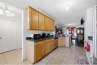 7878 Tanbier Drive, Orlando, FL 32818 - Photo 14