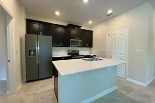 2999 Aqua Virgo Loop, Orlando, FL 32837 - Photo 8