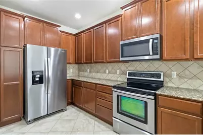 8681 Lower Villagewalk Circle, Orlando, FL 32827 - Photo 22