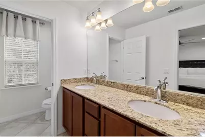 8681 Lower Villagewalk Circle, Orlando, FL 32827 - Photo 48