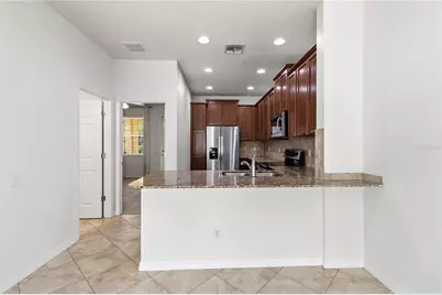 8681 Lower Villagewalk Circle, Orlando, FL 32827 - Photo 20