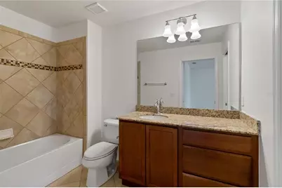 8681 Lower Villagewalk Circle, Orlando, FL 32827 - Photo 38