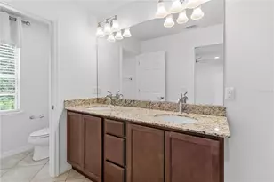 8681 Lower Villagewalk Cir, Orlando, FL 32827 - Photo 34