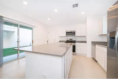 7428 Ivy Tendril Avenue, Orlando, FL 32829 - Photo 8