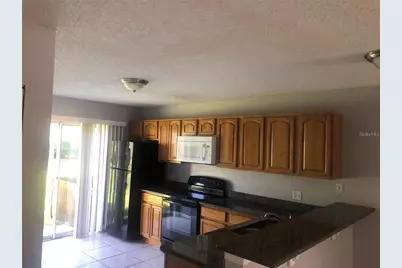 3651 N Goldenrod Road #E103, Winter Park, FL 32792 - Photo 2