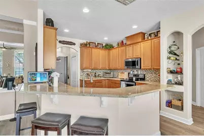 9957 Oak Quarry Drive, Orlando, FL 32832 - Photo 18