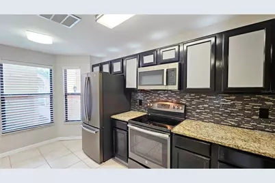 7805 Sugar Brook Court #7805, Orlando, FL 32819 - Photo 6