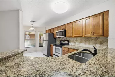 7764 Sugar Bend Drive #7764, Orlando, FL 32819 - Photo 8