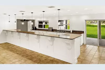 7129 Oakwind Drive, Orlando, FL 32818 - Photo 8