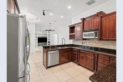 9181 Wickham Way, Orlando, FL 32836 - Photo 18