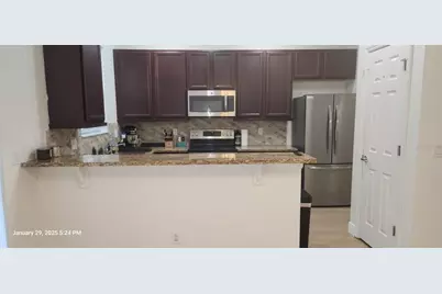 9241 Sweet Maple Avenue, Orlando, FL 32832 - Photo 6