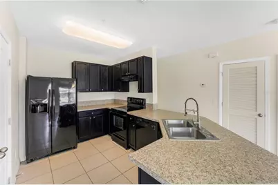 3441 Seneca Club Loop #25-101, Orlando, FL 32808 - Photo 6