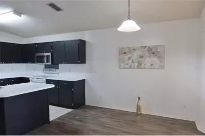 12821 Lower River Boulevard, Orlando, FL 32828 - Photo 4