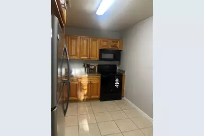 4174 Versailles Drive #4174D, Orlando, FL 32808 - Photo 18