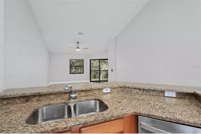 7679 Sugar Bend Drive #7784, Orlando, FL 32819 - Photo 12