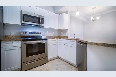 3701 Castle Pines Lane #3927, Orlando, FL 32839 - Photo 4