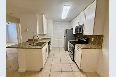 7630 Pissarro Drive #16105, Orlando, FL 32819 - Photo 4