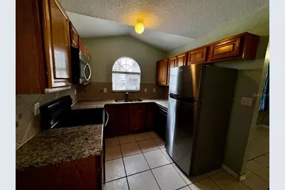 6741 Magnolia Pointe Circle, Orlando, FL 32810 - Photo 4