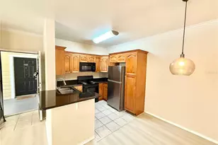 2528 Robert Trent Jones Dr, Orlando, FL 32835 - Photo 4